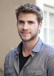 Liam Hemsworth - "The Hunger Games" press conference portraits by Armando Gallo (Los Angeles, March 1, 2012) - 19xHQ 40AceURY