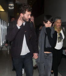 Jamie Dornan - Spotted at at LAX Airport with his wife, Amelia Warner - January 13, 2015 - 69xHQ EAAaLjm3
