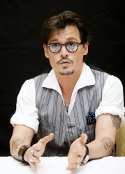 Johnny Depp - "Pirates of the Caribbean: On Stranger Tides" press conference portraits by Armando Gallo (Beverly Hills, May 4, 2011) - 22xHQ XnDboZ6S